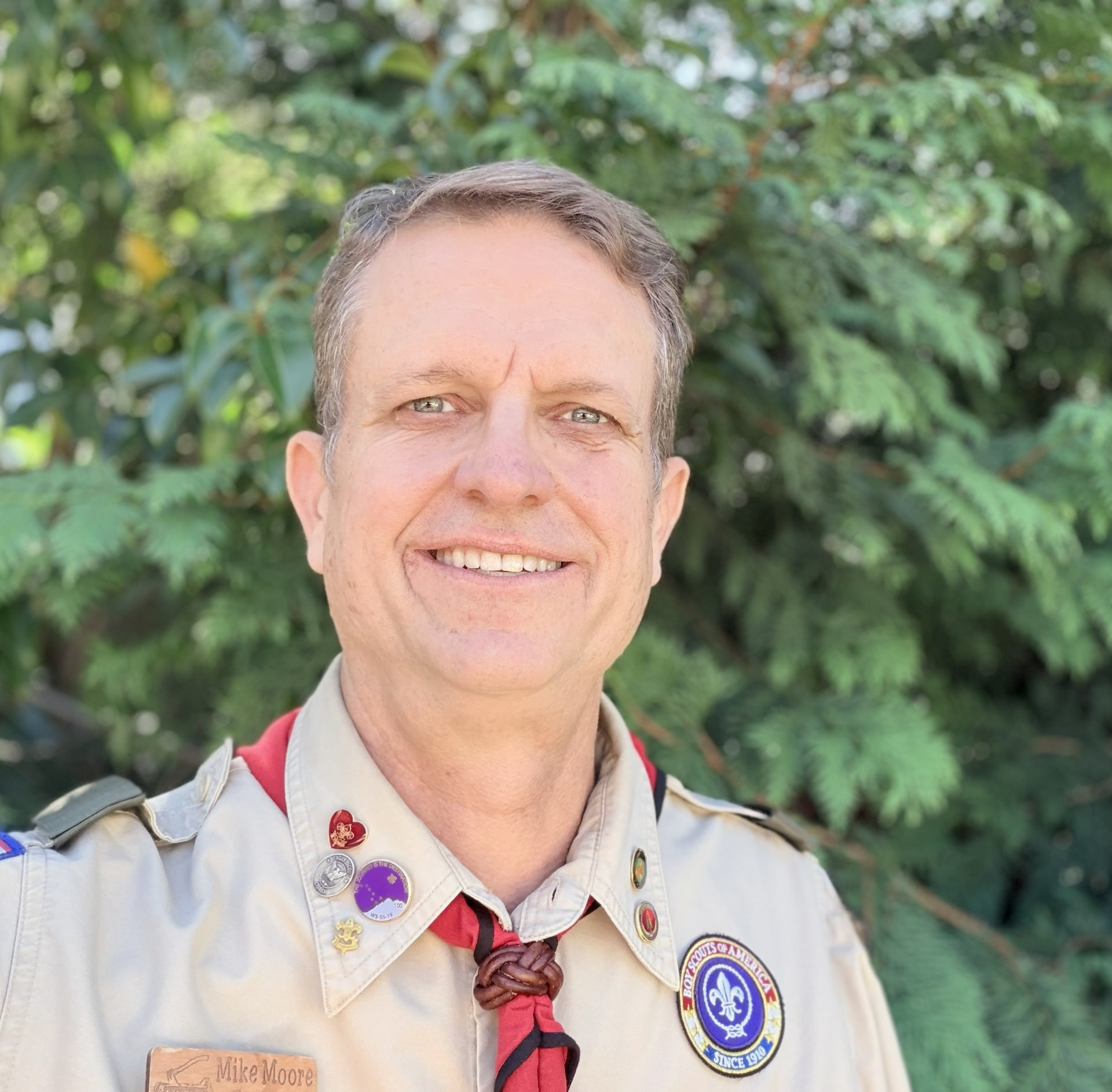 Mike Moore, Scoutmaster of Troop 75, in his Scouting America uniform
